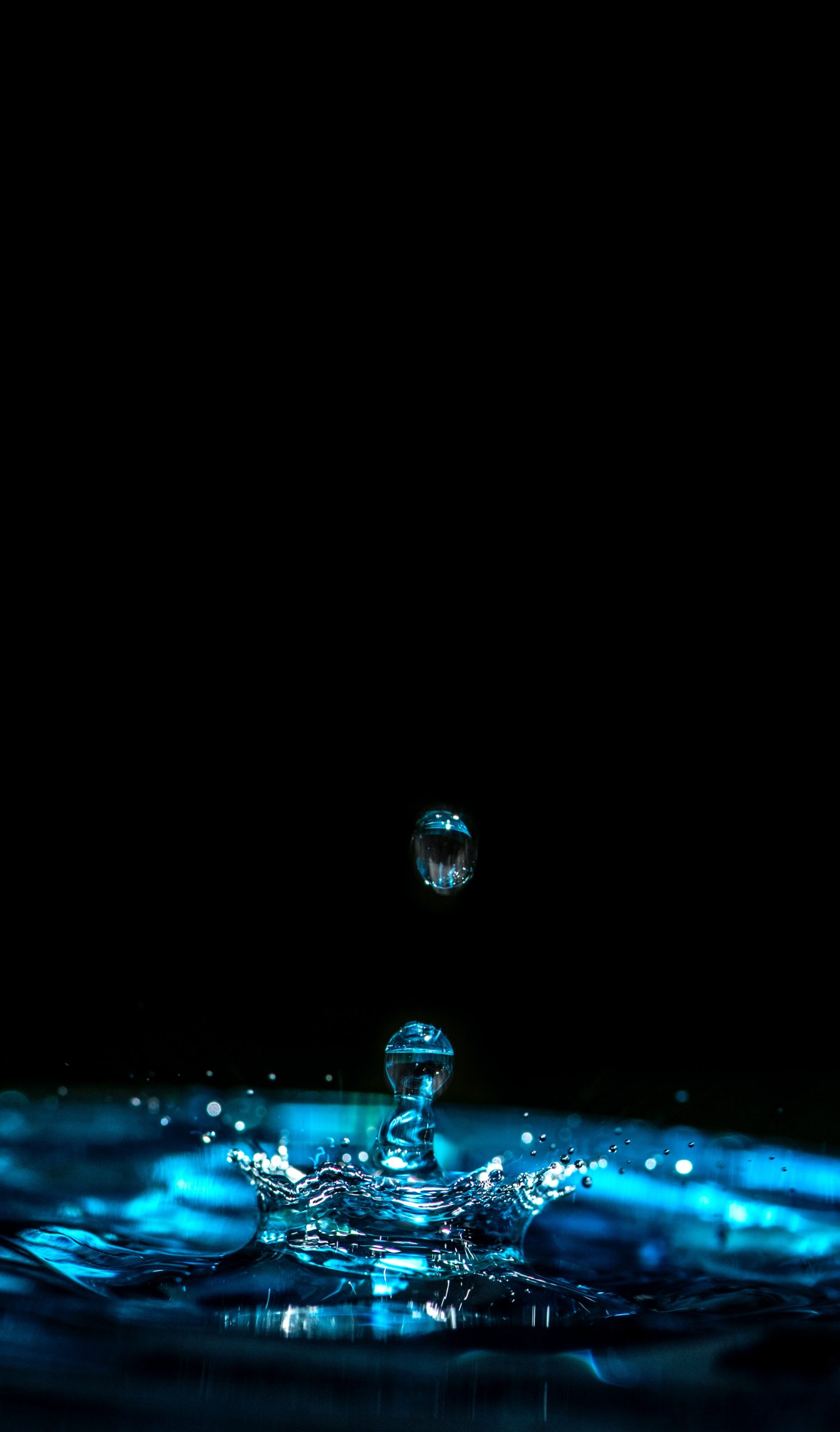 water drops falling into water